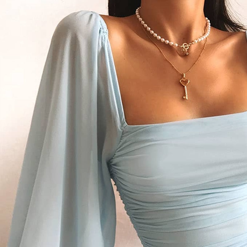 Vendra | Bodycon Mini Dress with Puff Sleeves – Light Blue